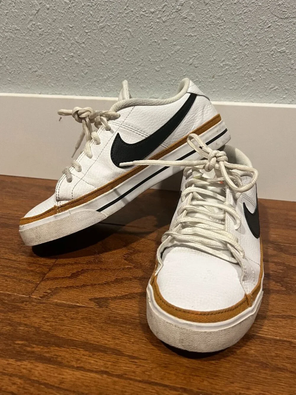 Nike Court Legacy White Sneakers with Black Swoosh and Tan Accent